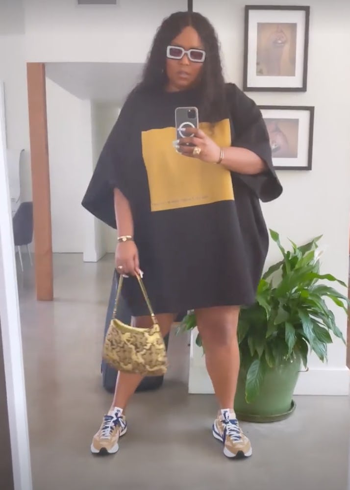 Lizzo is a wearing an oversized T-shirt in July 2021. 