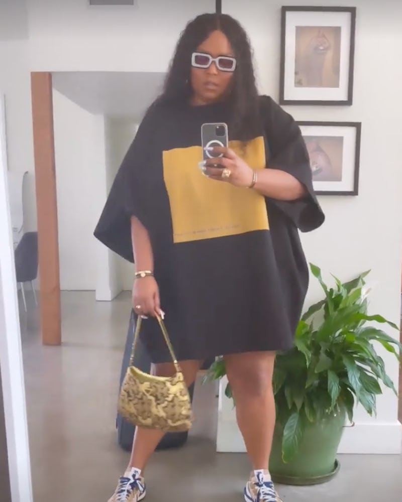 Lizzo is a wearing an oversized T-shirt in July 2021. 