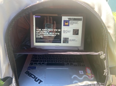 A close-up of a Macbook Air inside the LapDome tent