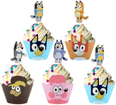 Five cupcakes with "Bluey" themed wrappers and toppers