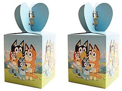 Close up of two party favor boxes featuring characters from "Bluey"