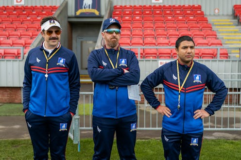 Coach Ted, Beard, and Nate all look on at a practice in 'Ted Lasso' Season 2