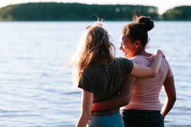 young women enjoy a carefree summer day at a lake, in need of lake Instagram captions.