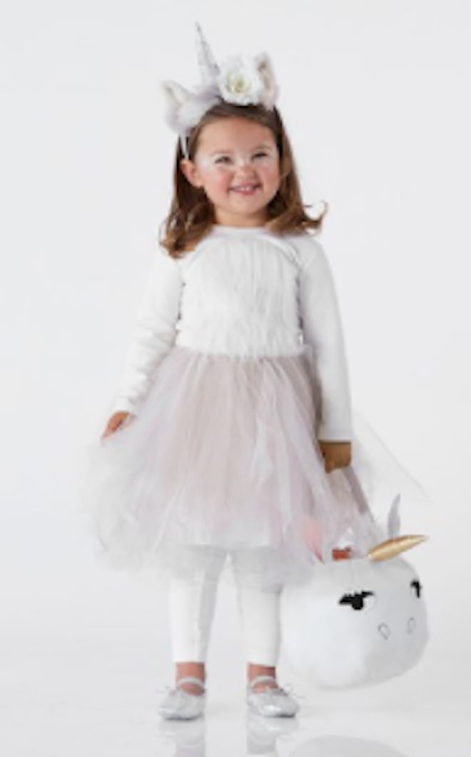 A child unicorn costume