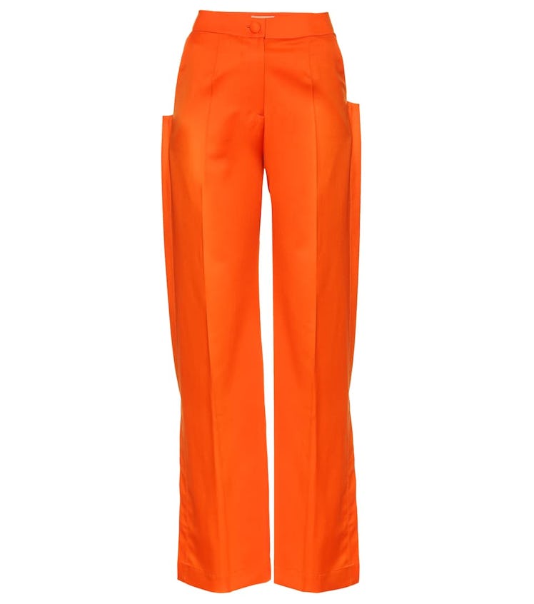 Orange high-rise flared wool pants from MATERIEL Tbilisi, available to shop on Mytheresa.