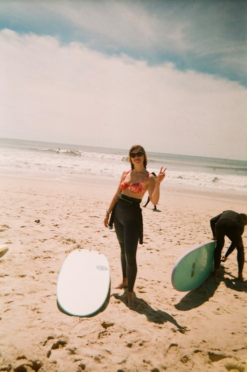 Aemilia Madden surfing