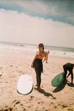 Aemilia Madden surfing