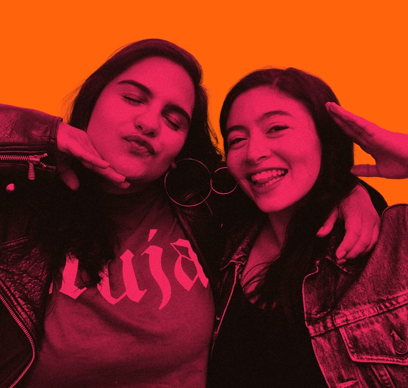 Veronica Lopez holding her hand under her chin and blowing a kiss and Melanie Mignucci smiling with ...