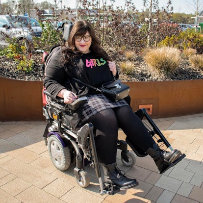 A plus size model in Russo's plus size wheelchair 