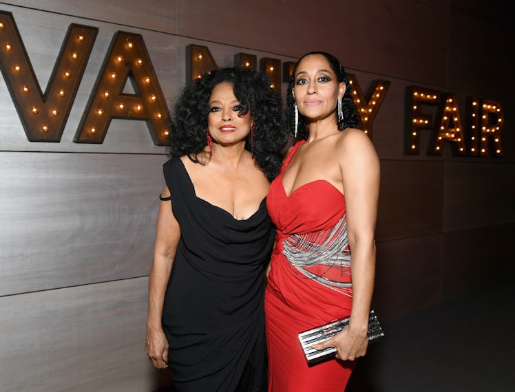 Diana Ross in a black dress and Tracee Ellis Ross in a red dress