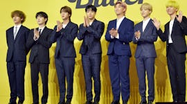 BTS at the release of their "Butter" single, which you could borrow lyrics from for Instagram captio...