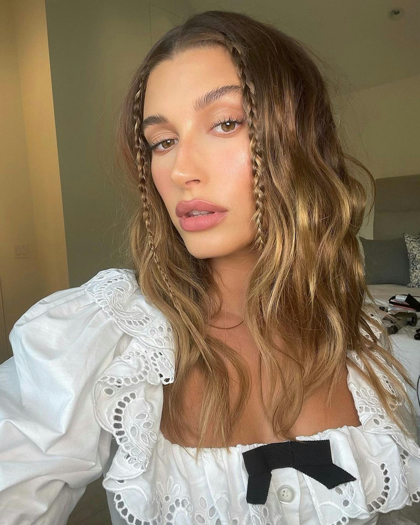 Hailey Bieber's FaceFraming Braids Encapsulate The '90s Aesthetic
