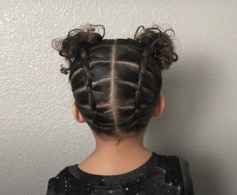 Back of little girl's head, showing off pigtail hair style with sections in bands for style 