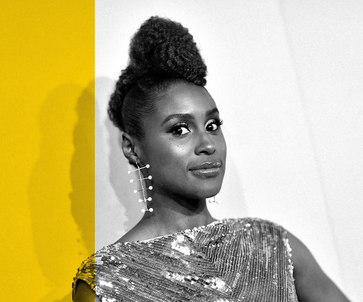 Issa Rae wearing a sequin party dress, with her soft curls in a high bun