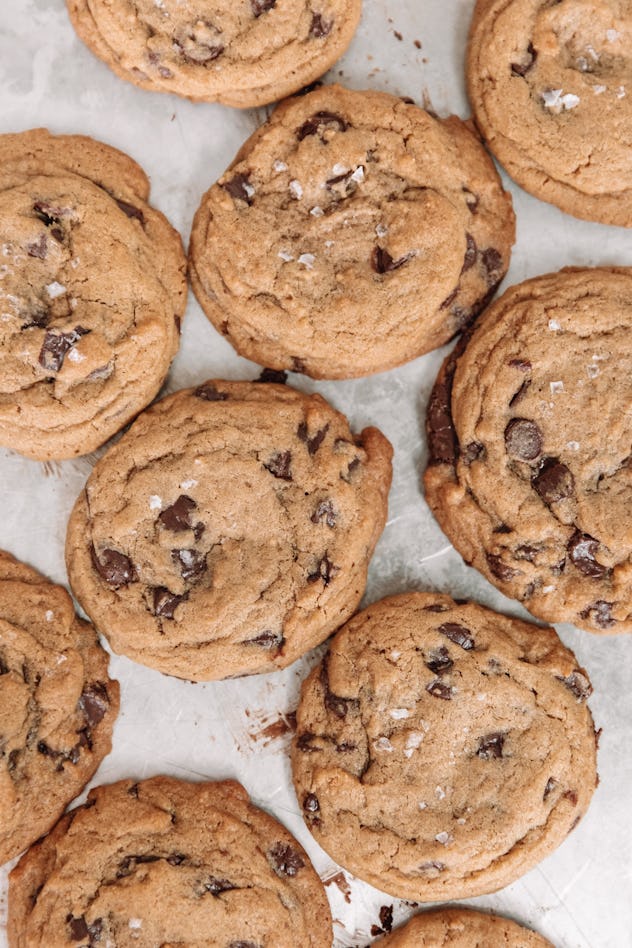 chocolate chip cookies topped with flaky sea salt, shot from above