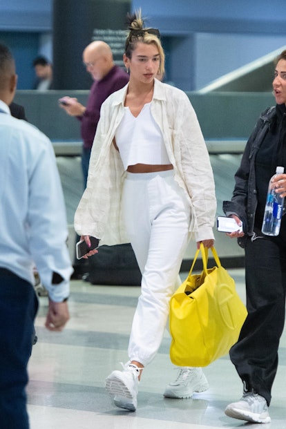 Singer Dua Lipa rocks a relaxed look as she arrives at JFK Airport in New York.