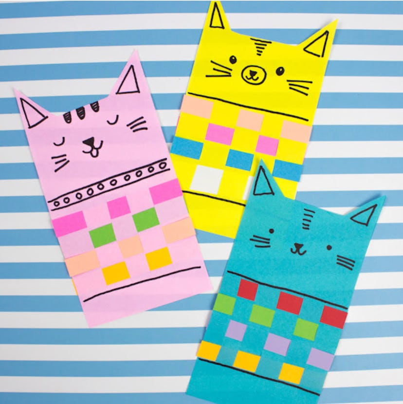 Woven paper cats are a fun construction paper craft to make with kids. 