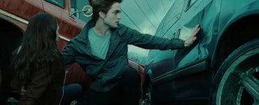 Edward stops the truck from hitting Bella in a scene from 'Twilight' with quotes you should use as I...