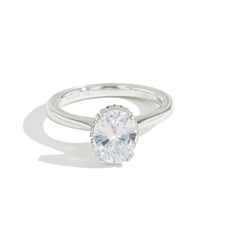 J.R.DUNN's oval diamond hidden halo engagement ring. 