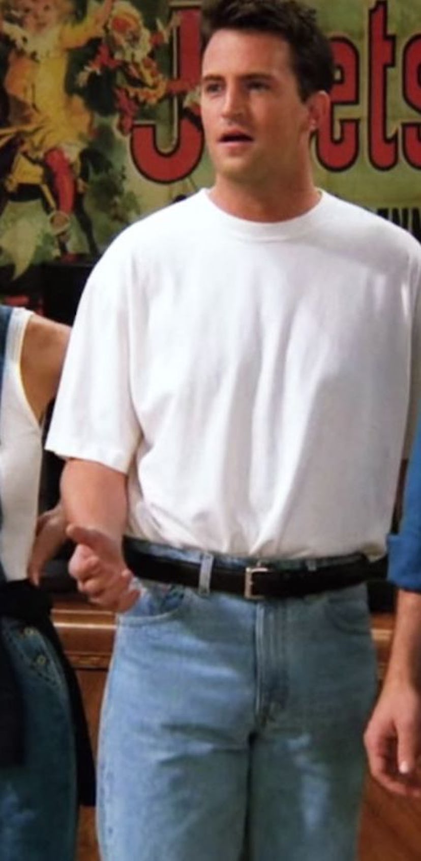 See the guy outfits from 'Friends' that epitomize '90s fashion, from layered tees and dad jeans to v...