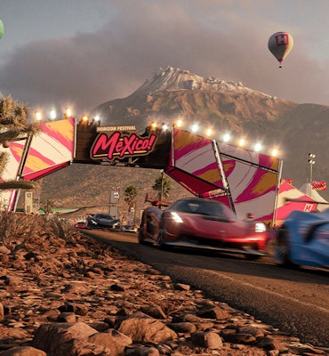 Race cars driving past Forza Horizon Mexico sign