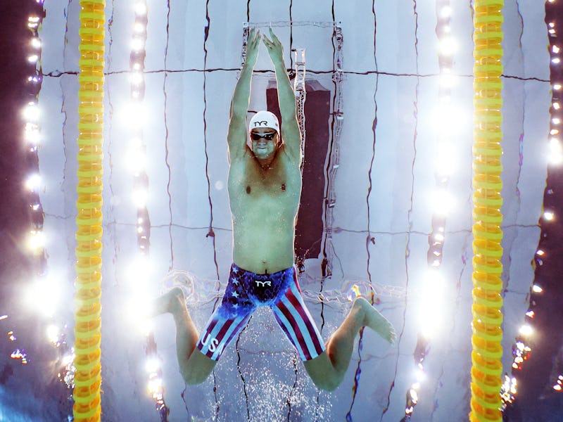 Michael Andrew of Team United States competes in heat five of the Men's 100m Breaststroke on day one...