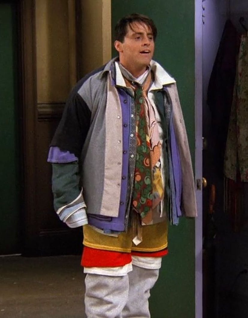 See the guy outfits from 'Friends' that epitomize '90s fashion, from layered tees and dad jeans to v...