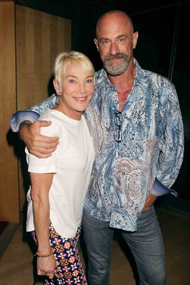 Chris Meloni posing for a photo with his wife