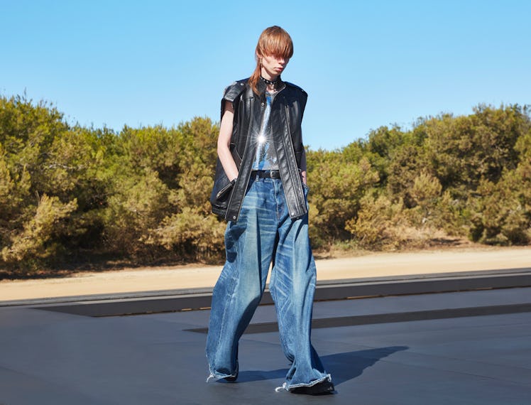 A model wearing baggy Celine Homme pants designed by Hedi Slimane