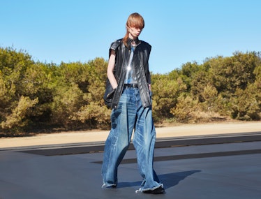 A model wearing baggy Celine Homme pants designed by Hedi Slimane