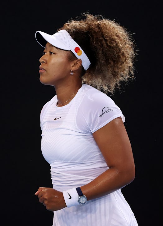 Naomi Osaka of Japan celebrates after winning a point in her Women's quarterfinals match against Iri...
