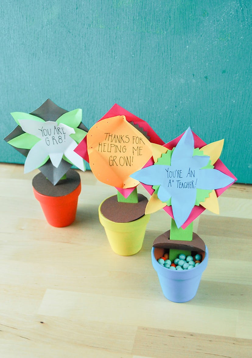 Flower pot gifts can be made using construction paper craft supplies.