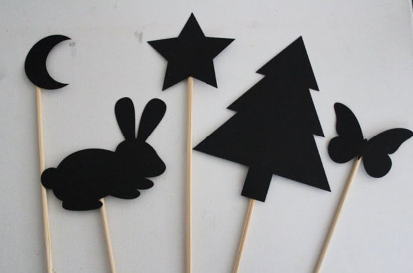 Shadow puppets are an easy construction paper craft to make. 