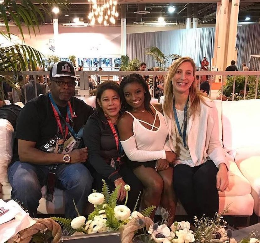 Simone and her parents, Nellie and Ronald at a 2017 Superbowl tailgate party.