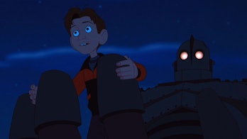 Hogarth in the Iron Giant’s palm.