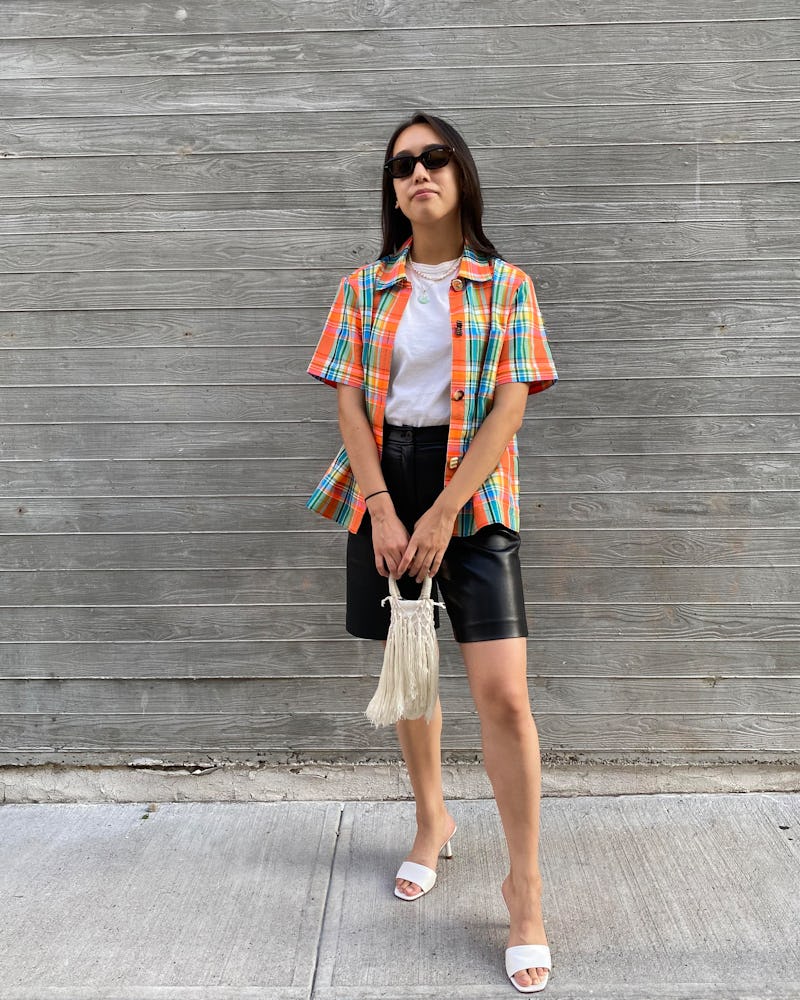 Marina Liao carrying a Petit Kouraj bag.