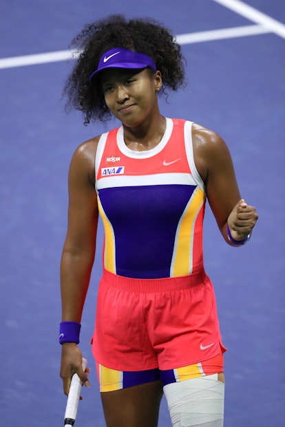 Naomi Osaka of Japan celebrates match point during her Women’s Singles fourth round match win agains...
