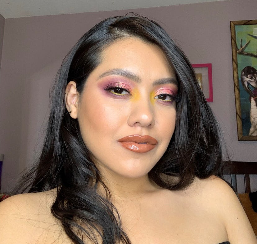 Diana, an e.l.f. Game Up Winner, wearing yellow and pink eyeshadow as well as a nude and glossy lip ...