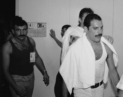 Rock star Freddie Mercury and boyfriend Jim Hutton backstage at the Live Aid concert at Wembley, 13t...