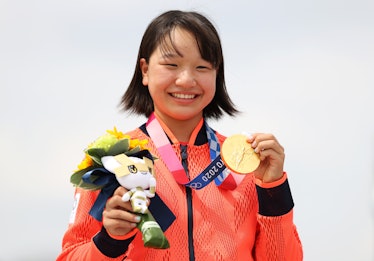 Momiji Nishiya of Team Japan poses with her gold medal during the Women's Street Final medal ceremon...