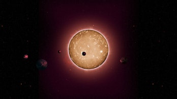 An illustration of a group of five planets orbiting a star.