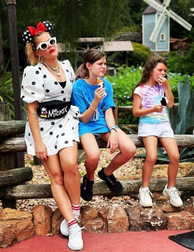 Busy Philipps  and her daughters at  EPCOT during a family vacation to Walt Disney World Resort in L...