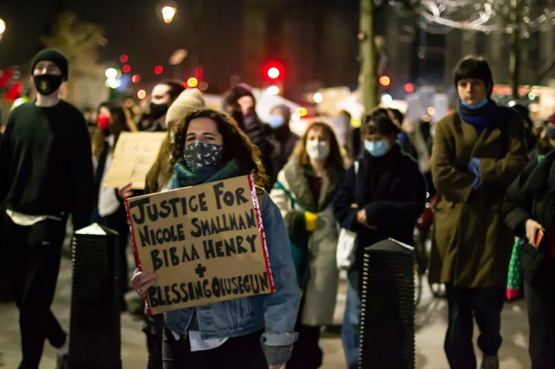 Protest sign saying "Justice for Nicole Smallman, Bibaa Henry, & Blessing Olusegun"