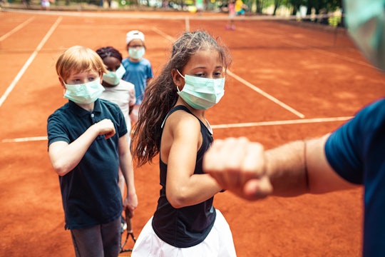 How Does the Delta Variant Affect Kids Like the Ones Seen Here Wearing Masks