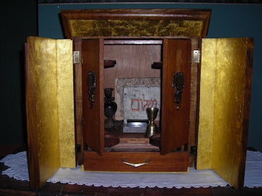 The opened Dybbuk Box is housed in an acacia-wood ark lined with gold leaf, which Jason Haxton built...