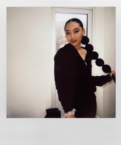 Sarah Griffiths, 20-year-old singer, known as Griff, in a polaroid wearing black clothing and a spec...