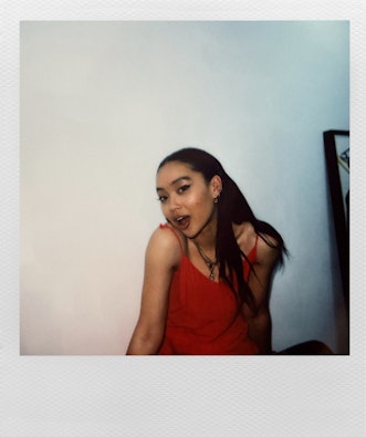 Sarah Griffiths, 20-year-old singer, known as Griff, in a polaroid acting surprised wearing a red to...