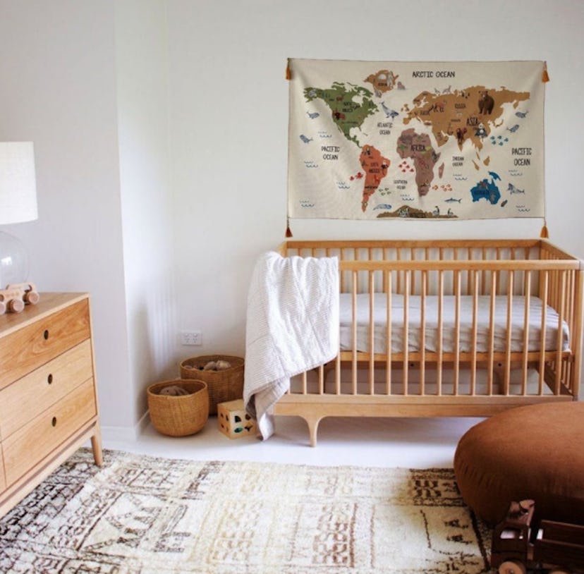 Map above baby's crib.