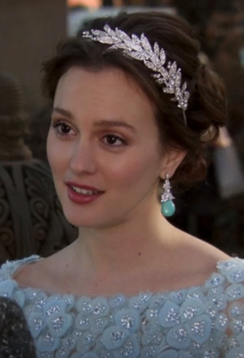 To match the embellished long-sleeve Elie Saab gown, Blair's wedding hair is styled in a low chignon...