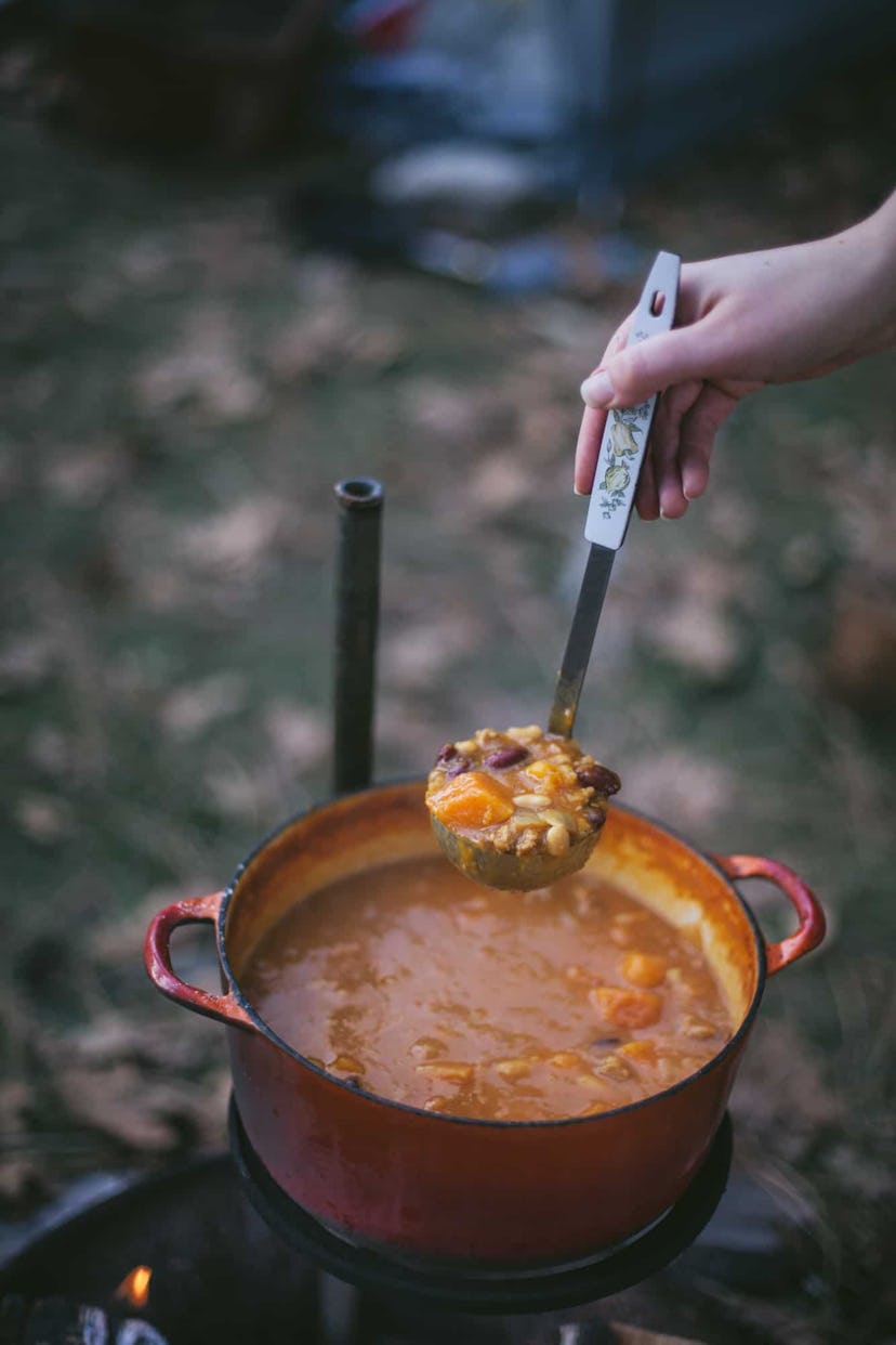butternut squash chili cooked over a campfire